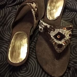 Brown sequined sandles .